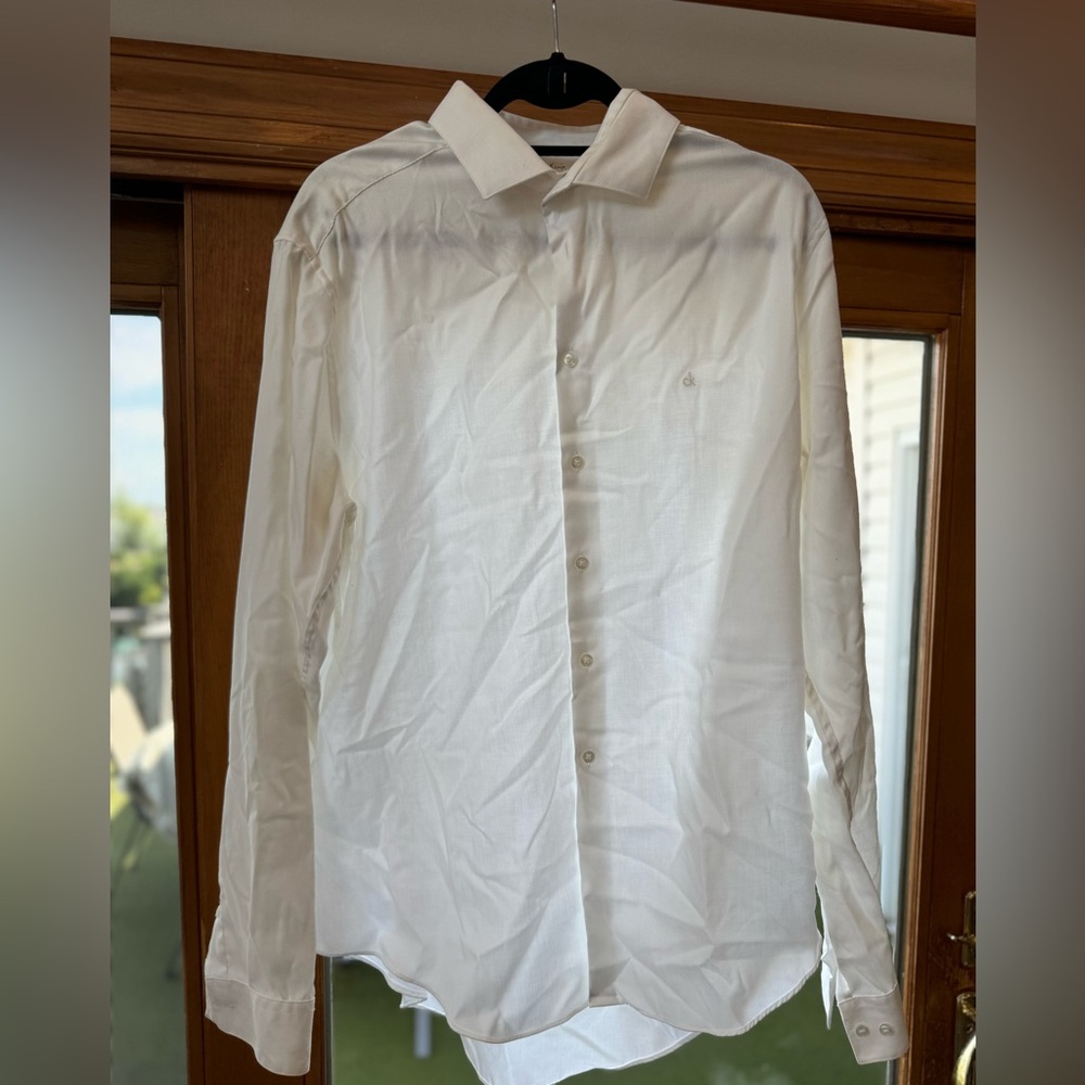 Long sleeve white Calvin Klein dress shirt. Size Large